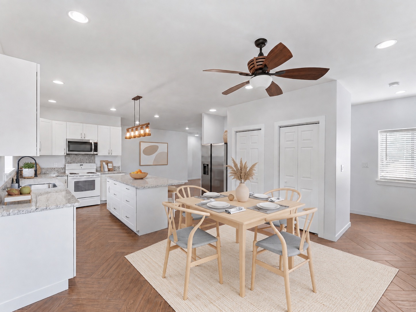 Kitchen and dining area with island and pendant lighting
