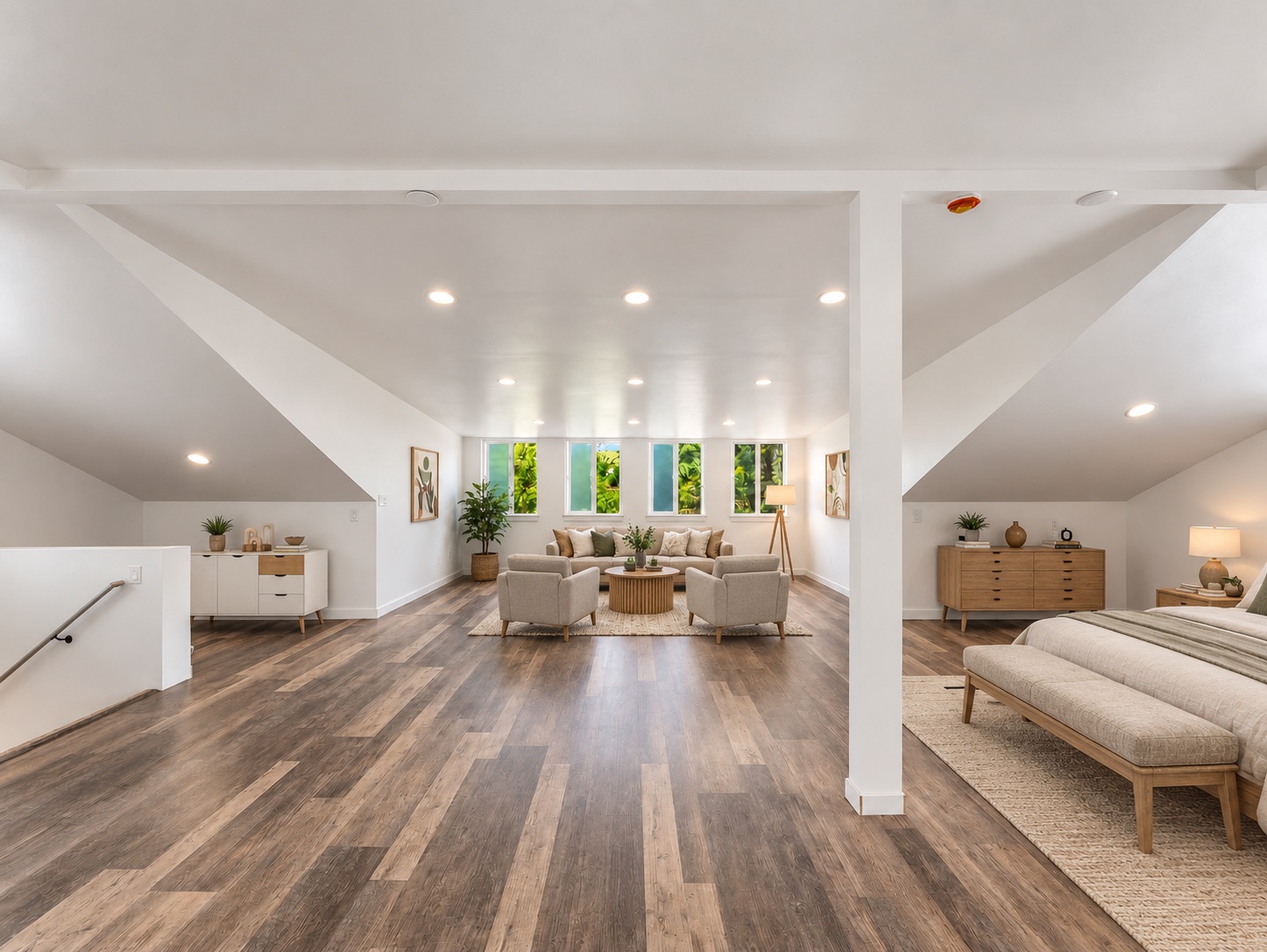 Primary suite with vaulted ceilings and sitting area